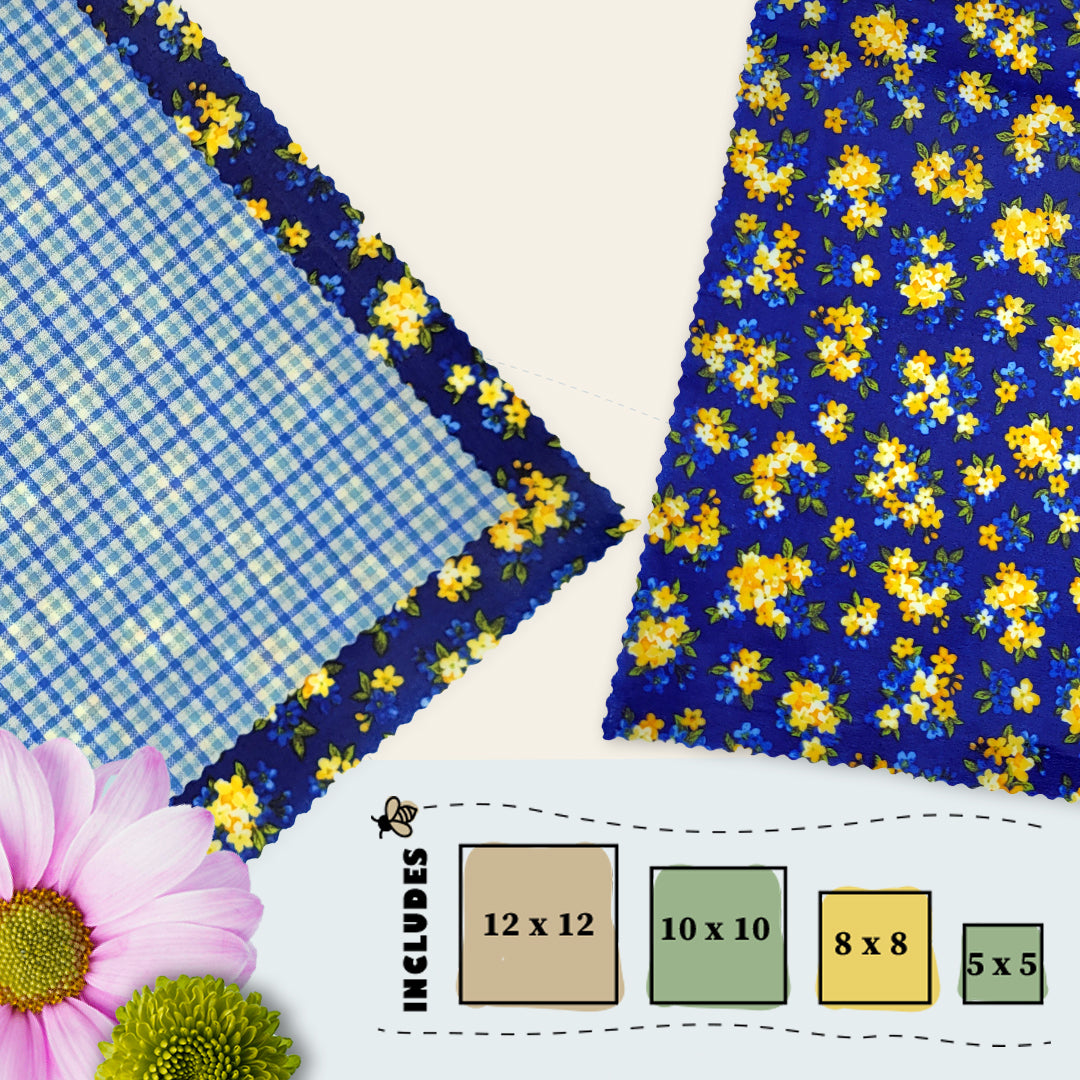 Beeswax food wraps in four sizes with a navy background, yellow floral print, and blue gingham secondary fabric, part of the Midnight Meadow pack by Blindhound Farms